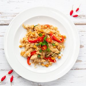 Chicken fried rice on a white plate