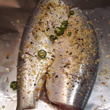 Baked herring with vinegar and pickling spices