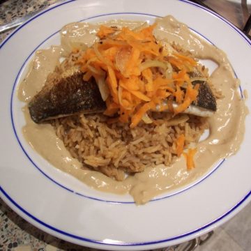 Sea bass with tahini sauce and saffron rice