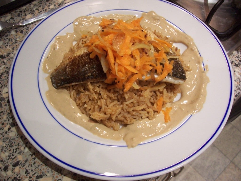Sea bass with tahini sauce and saffron rice