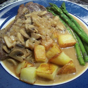 steak in a creamy mushroom and whisky sauce