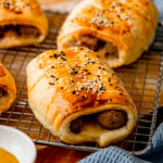 double sausage rolls on cooling rack