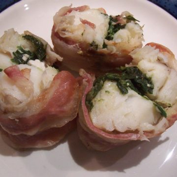 Monkfish wrapped in pancetta with a fresh herb filling