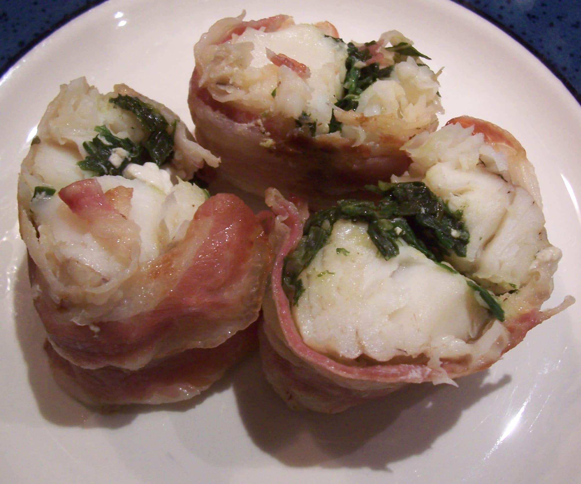 Monkfish tail warped in pancetta with a fresh herb filling