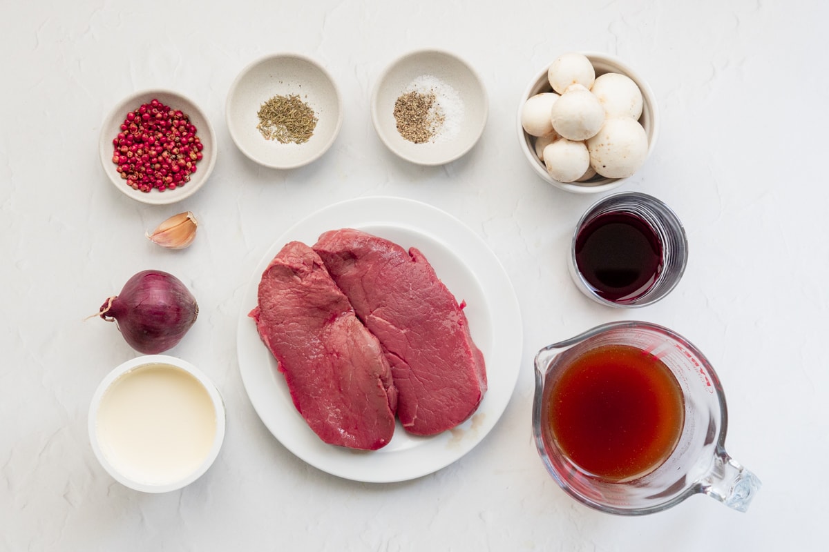 Ingredients for steak in pink peppercorn sauce