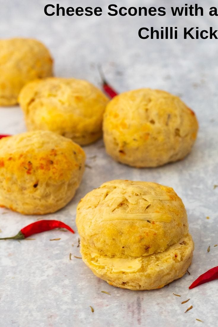 Cheese and chilli scones on a grey background