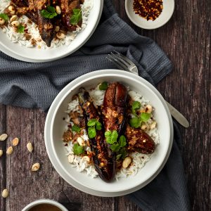 stuffed aubergine curry in a bowl with rice