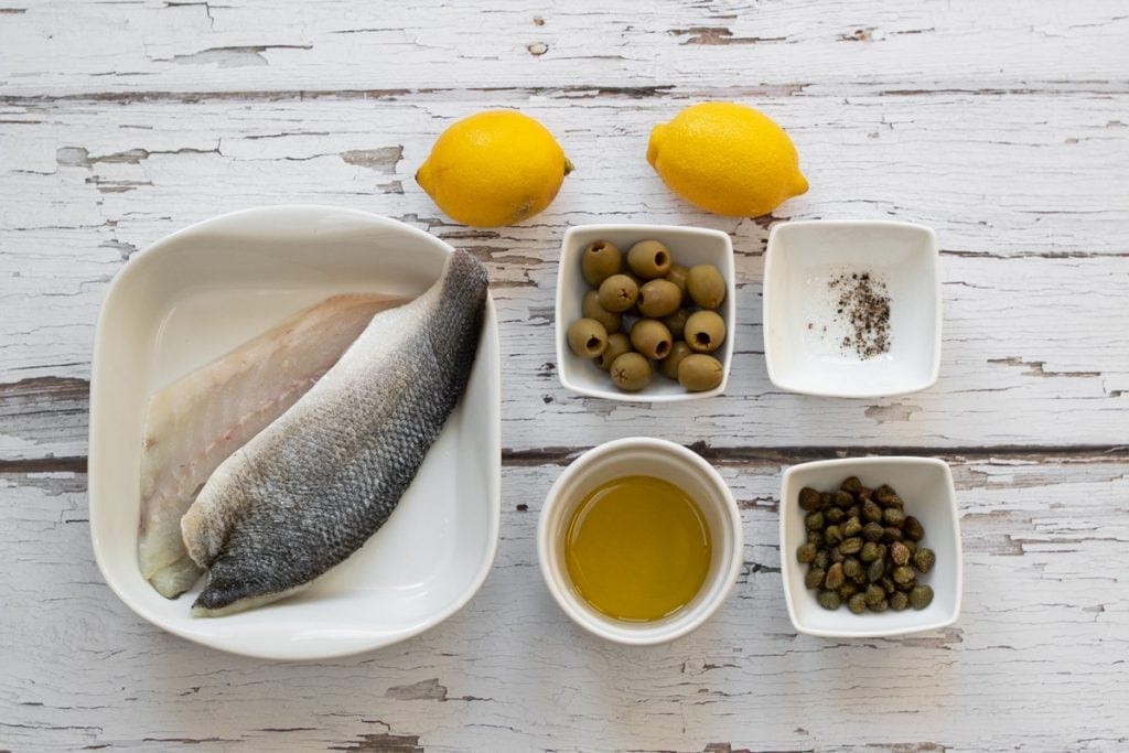 Ingredients for sea bass with olives and capers