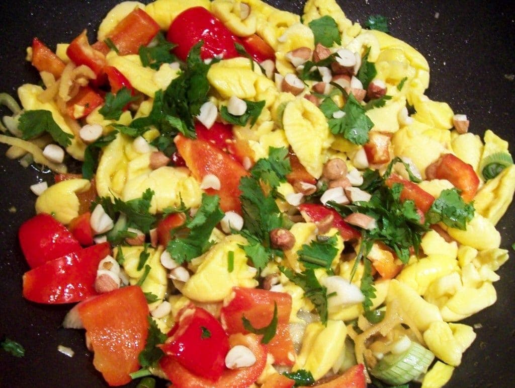 Stir fried ackee on a black plate