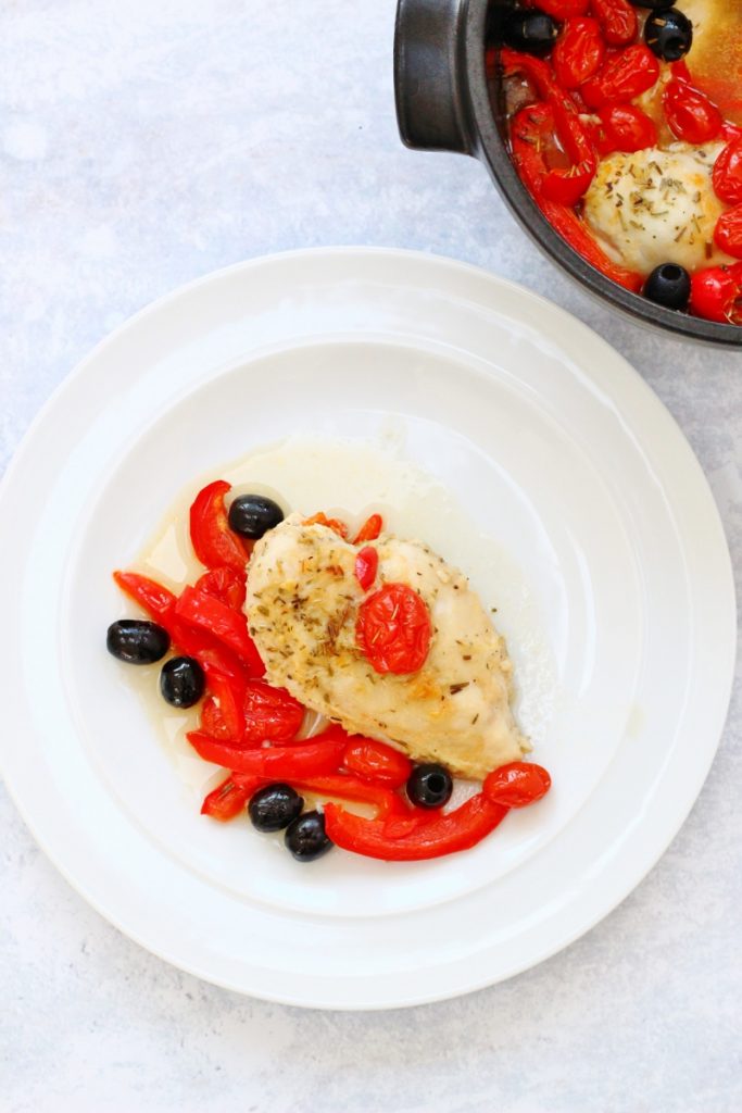 Baked Italian chicken recipe on a place and in a pan