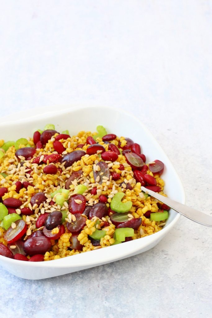 curried barley salad with red grapes, celery and kidney beans