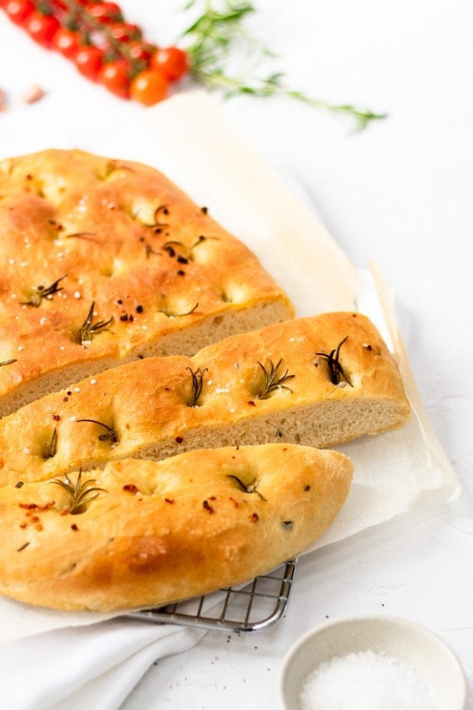 loaf of focaccia cut into a couple of slices