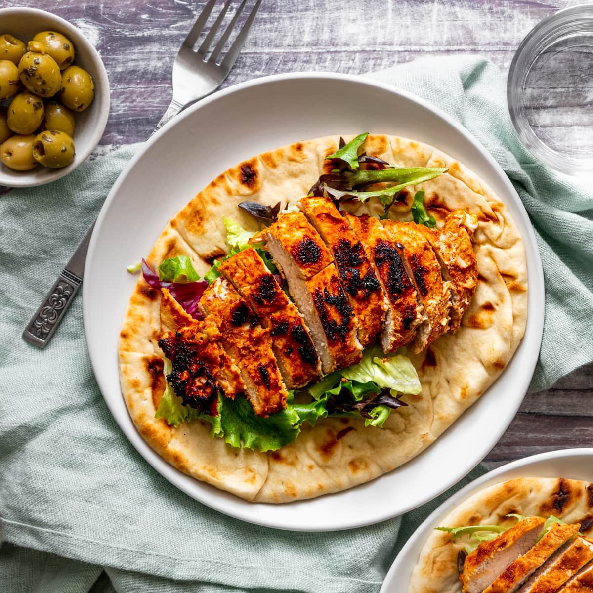 Griddled chicken on a flatbread