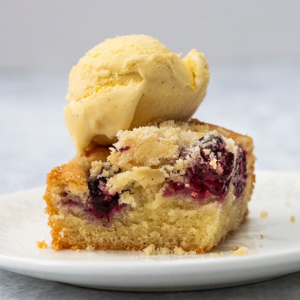 Piece of blackberry crumble cake