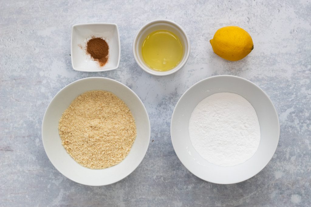 Ingredients for Cinnamon start biscuits: ground almonds, icing sugar, cinnamon, egg white, lemon juice