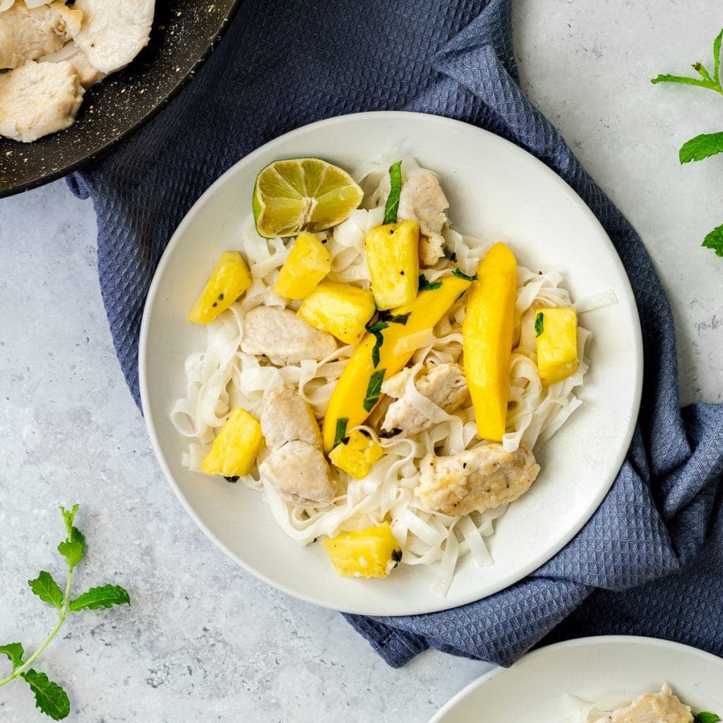 turkey mango pineapple stir fry in a bowl