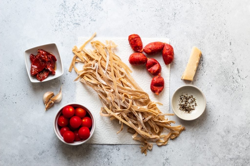 Ingredients for pasta with sundried tomatoes and chorizo