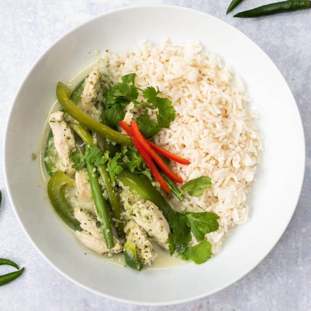 Thai green curry in a bowl with rice