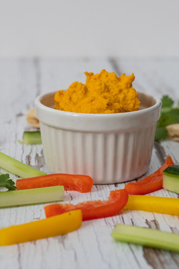 roasted carrot dip in a white ramekin