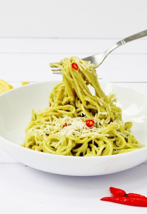 Avocado spaghetti with chilli and lemon juice topped with a little parmesan