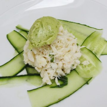 cucumber topped with crab salad and avocado sorbet