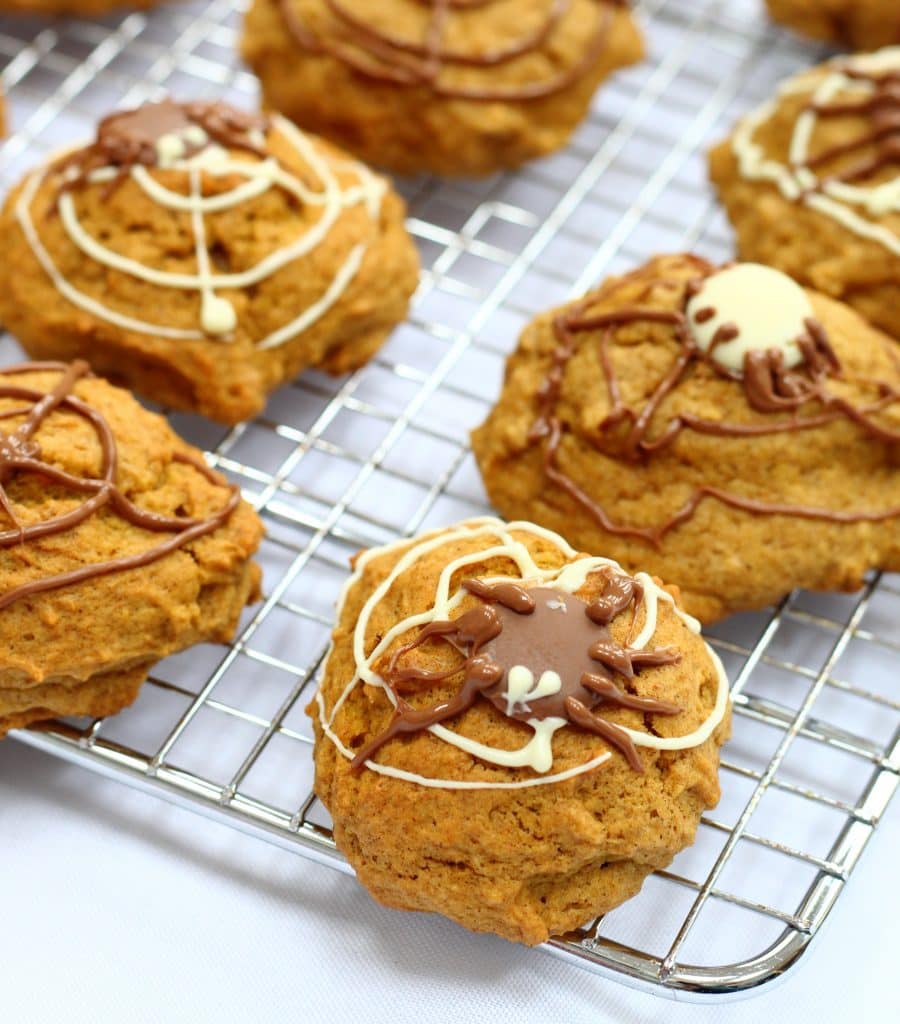 Spiced pumpkin cookies for Halloween on a cooling rack