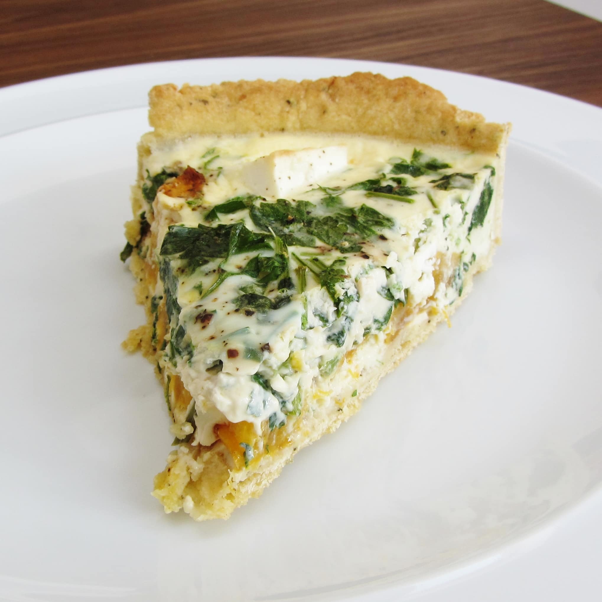 Vegetarian roasted pumpkin, spinach and feta quiche