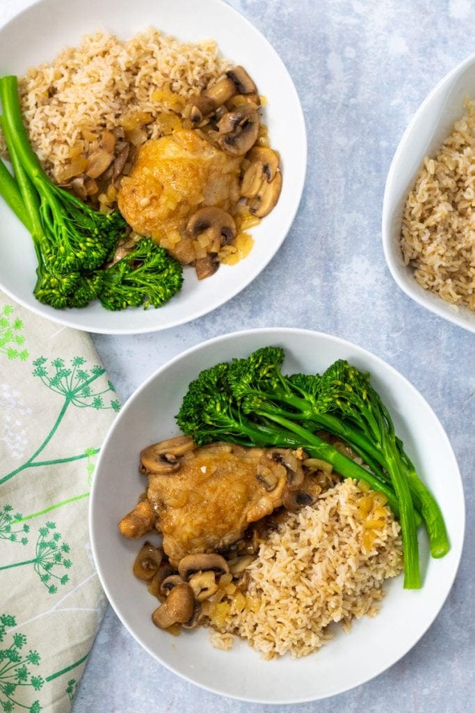 Two bowls of chicken anise, broccoli and rice