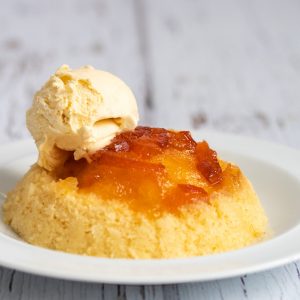 Microwaved marmalade sponge pudding with ice cream