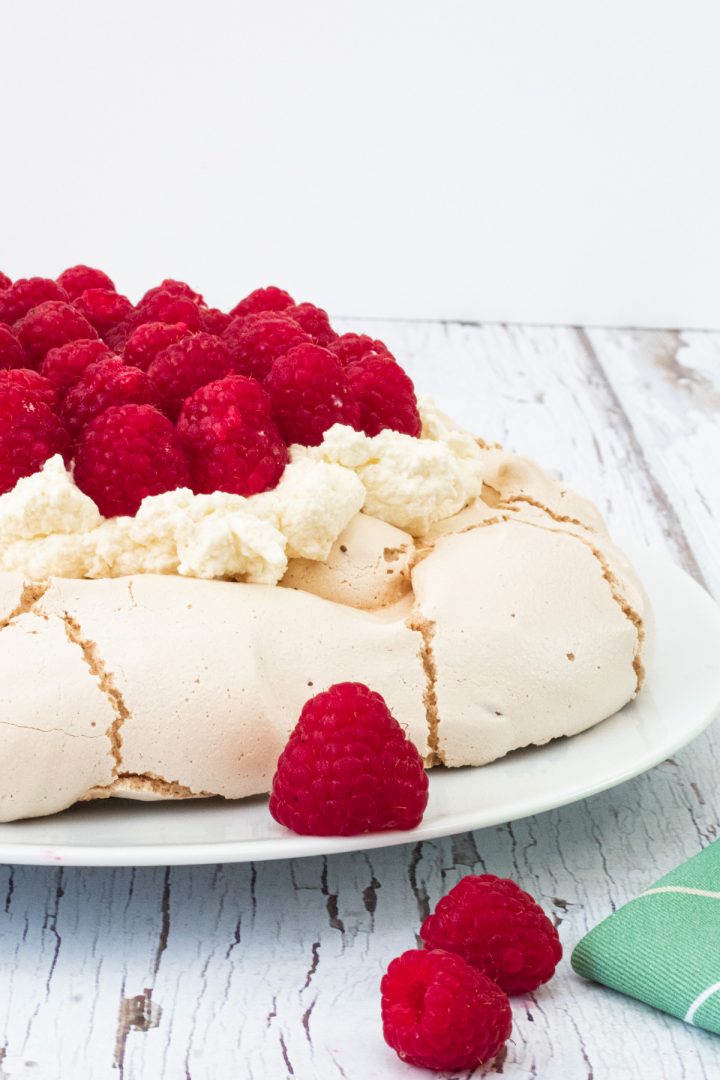 pavlova topped with raspberries