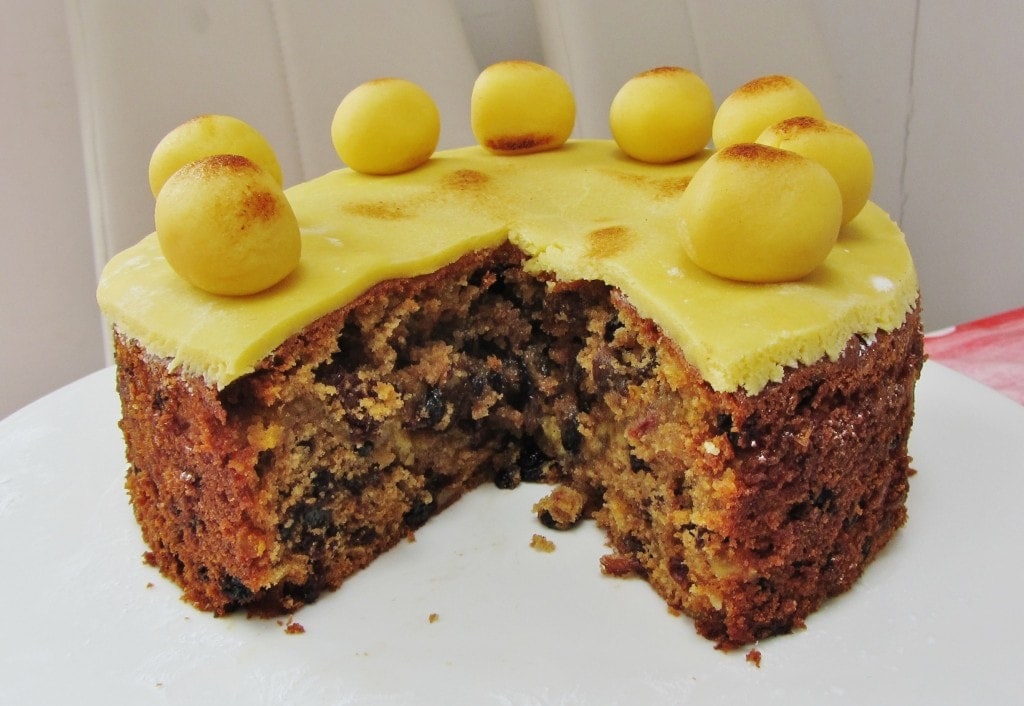 Simnel cake with a chunk cut out