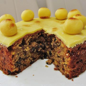 Simnel cake with a chunk cut out