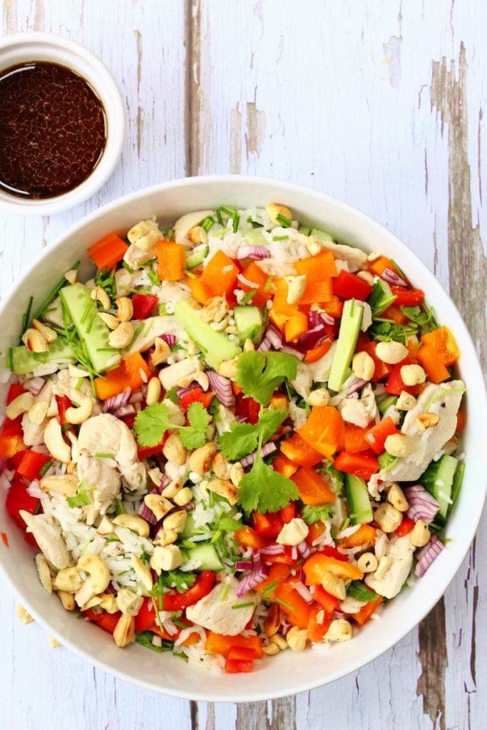 Oriental rice salad with crunchy vegetables and chicken with a soy lime dressing