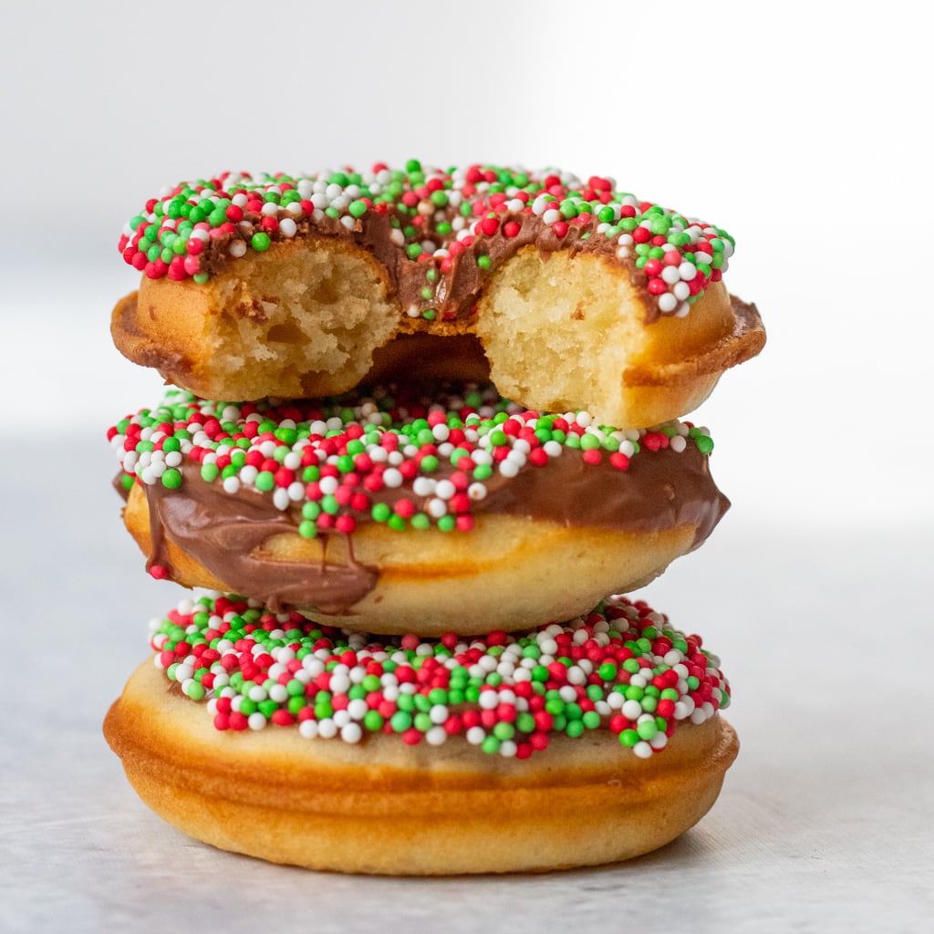stack of doughnuts with chocolate and sprinkles