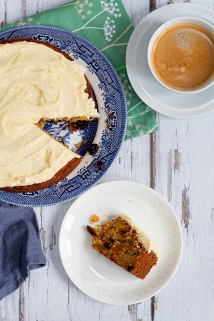 Flatlay of vegan carrot cake and coffee