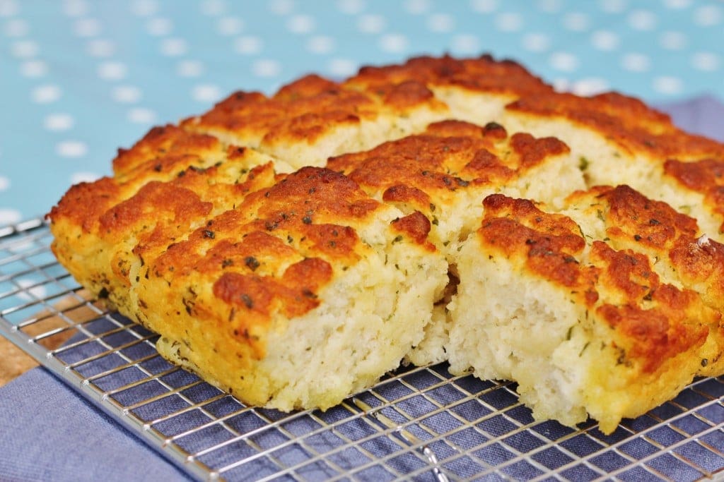 Garlic and Herb Butter Quick Bread on a cooling rack