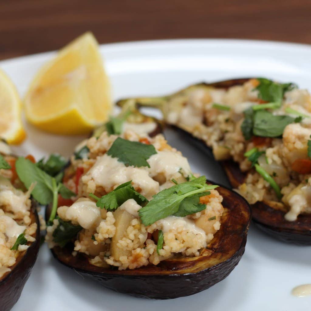 couscous stuffed aubergine with tahini sauce