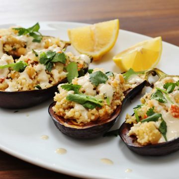 couscous stuffed aubergine with tahini sauce