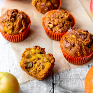 pumpkin and apple muffins with one broken in half