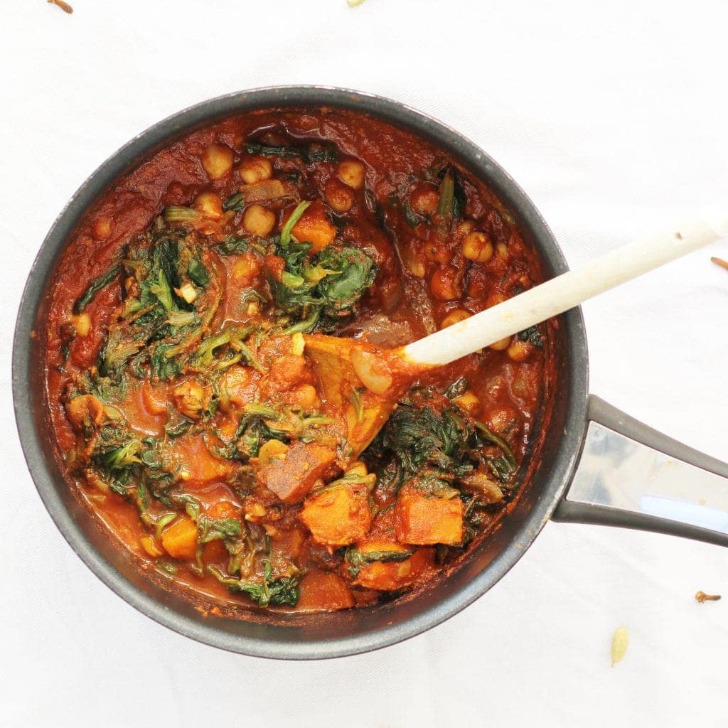 Pot of butternut squash and spinach curry