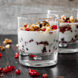 Glass of pomegranate yogurt fool