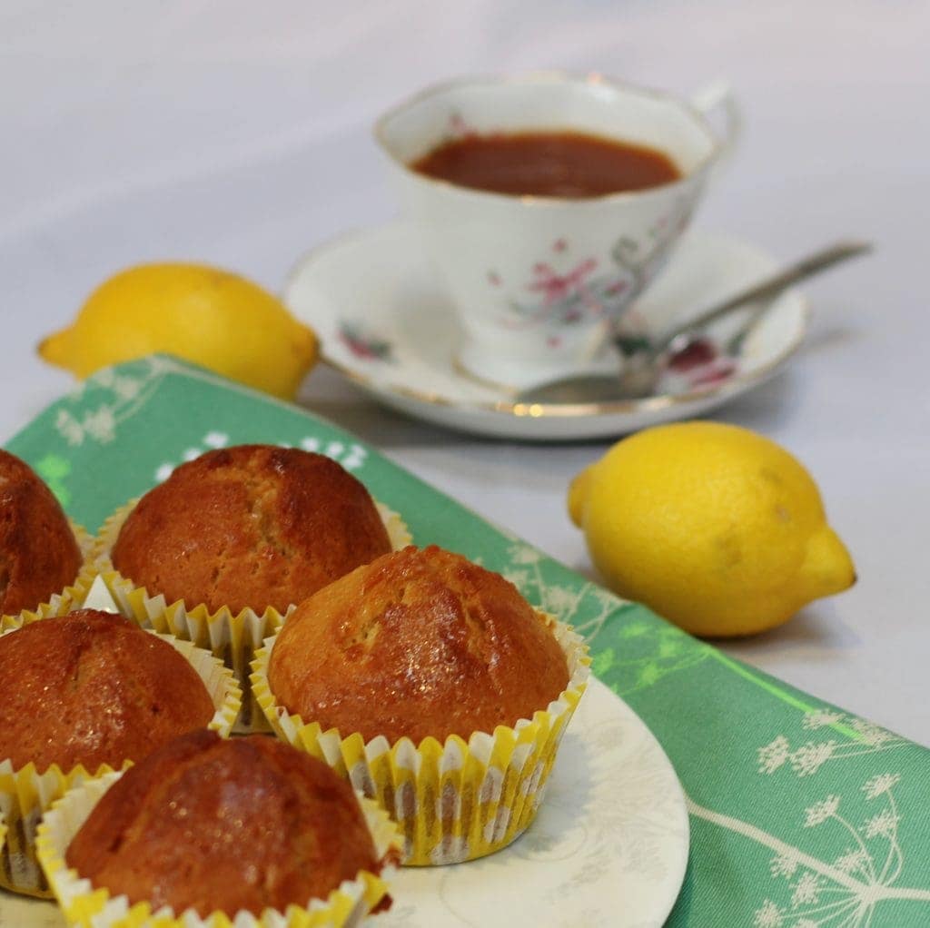 Dairy Free Lemon Muffins with cup of tea in background