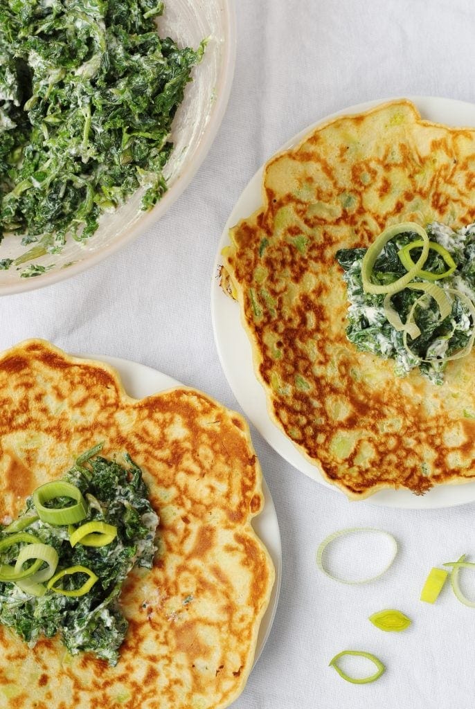 Leek pancakes with spinach, kale and ricotta