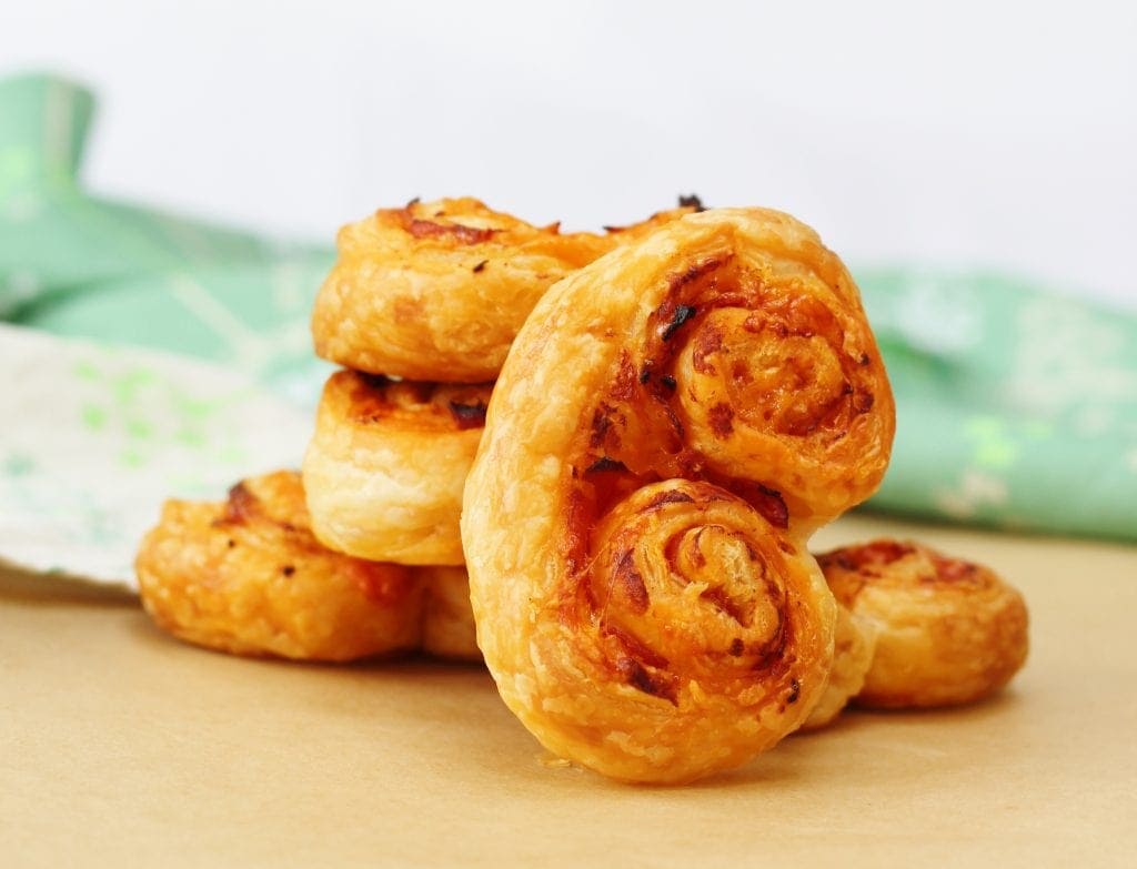 Cheesy chorizo pastries stacked up together