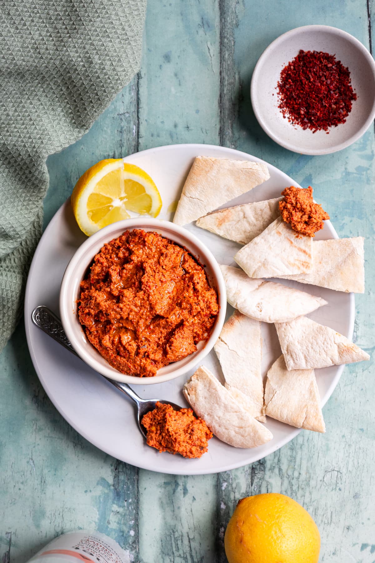 Flatlay of muhammara walnut red pepper dip