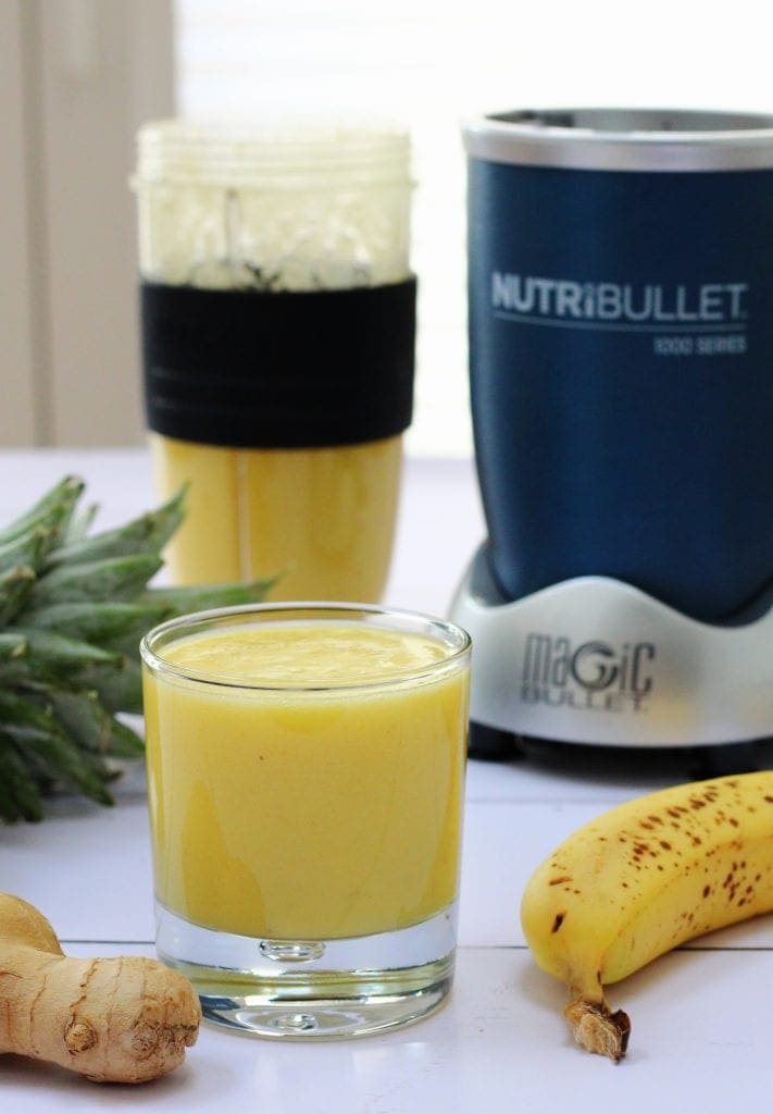 Tropical smoothie made with pineapple, banana, mango and ginger