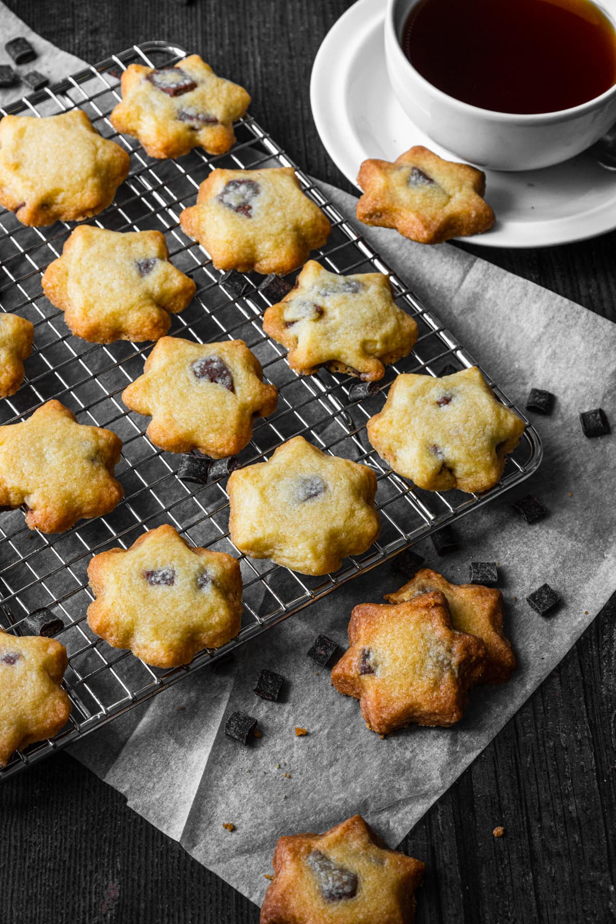 chocolate chip bicuits cooling on a tray