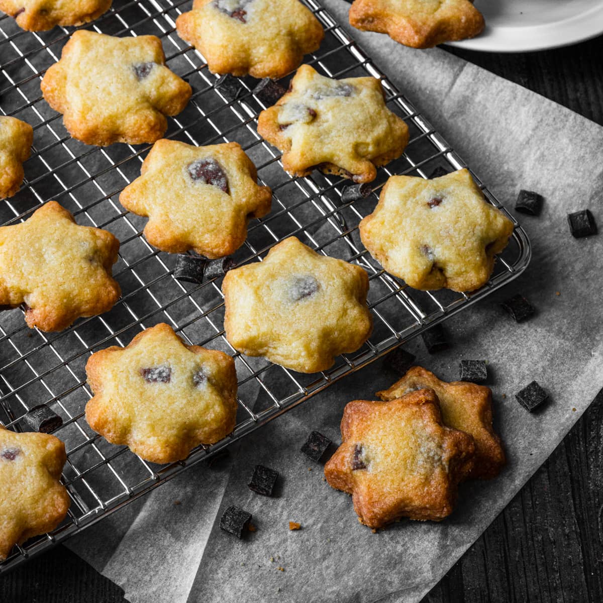 Chocolate chip biscuits on a cooling rack