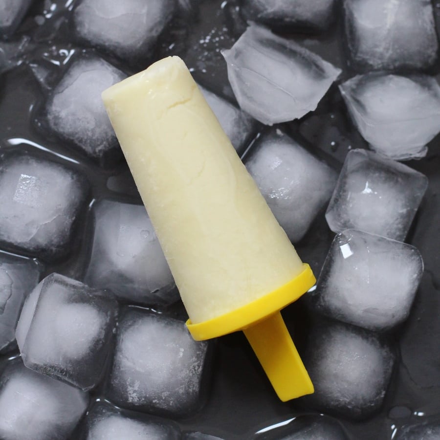 Homemade coconut milk ice lollies with pineapple