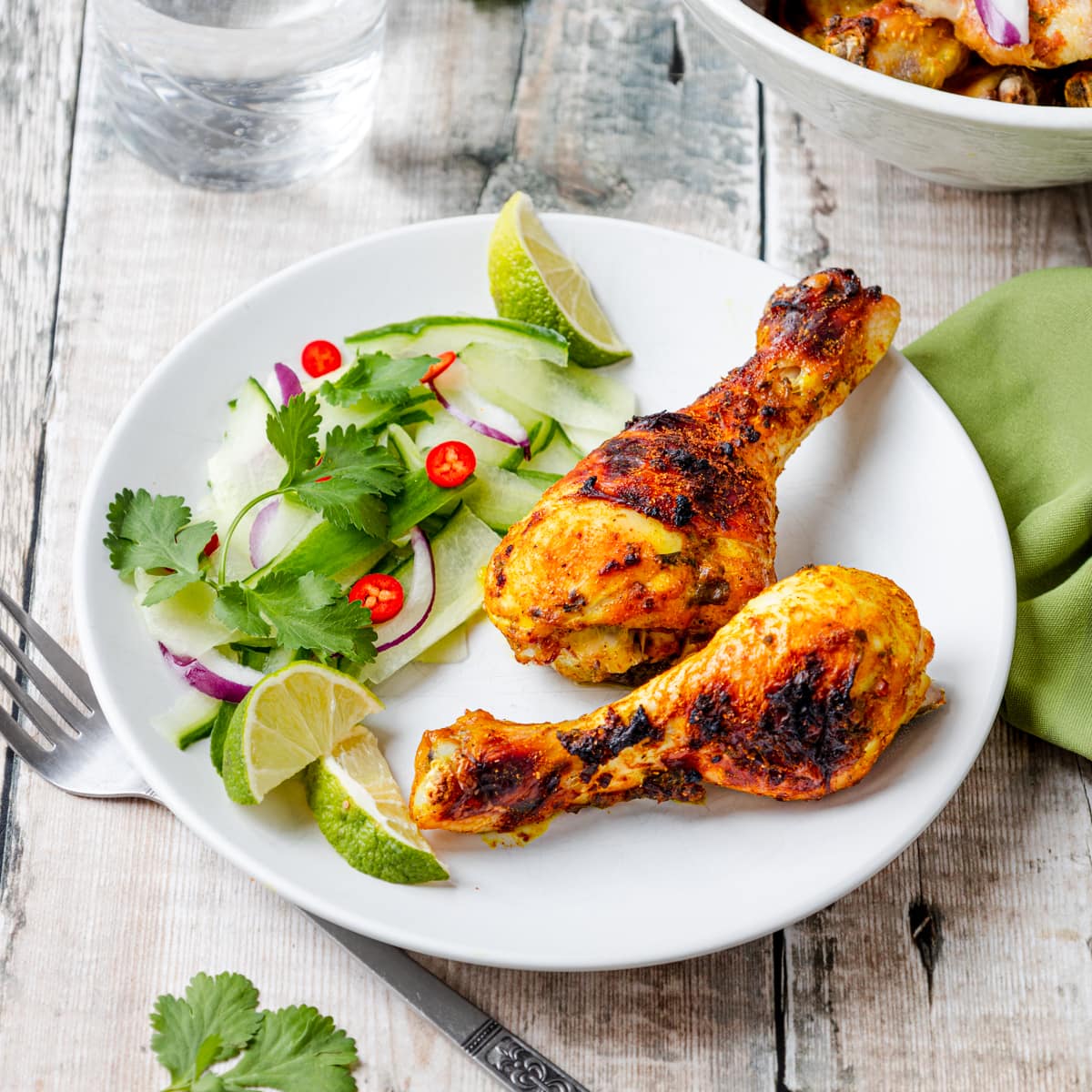 Thai bbq chicken legs on a plate